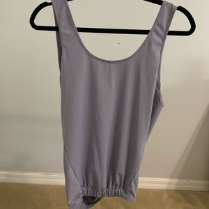 Fabletics light purple tank top.